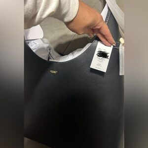 Black coach hand bag original with tags